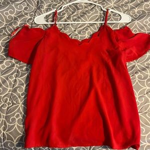cute red top, shoulders show.